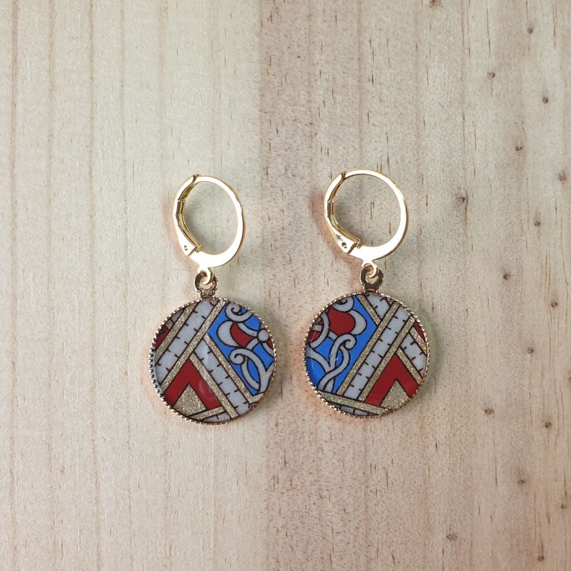 Brincos pingentes ouro/vermelho/azul