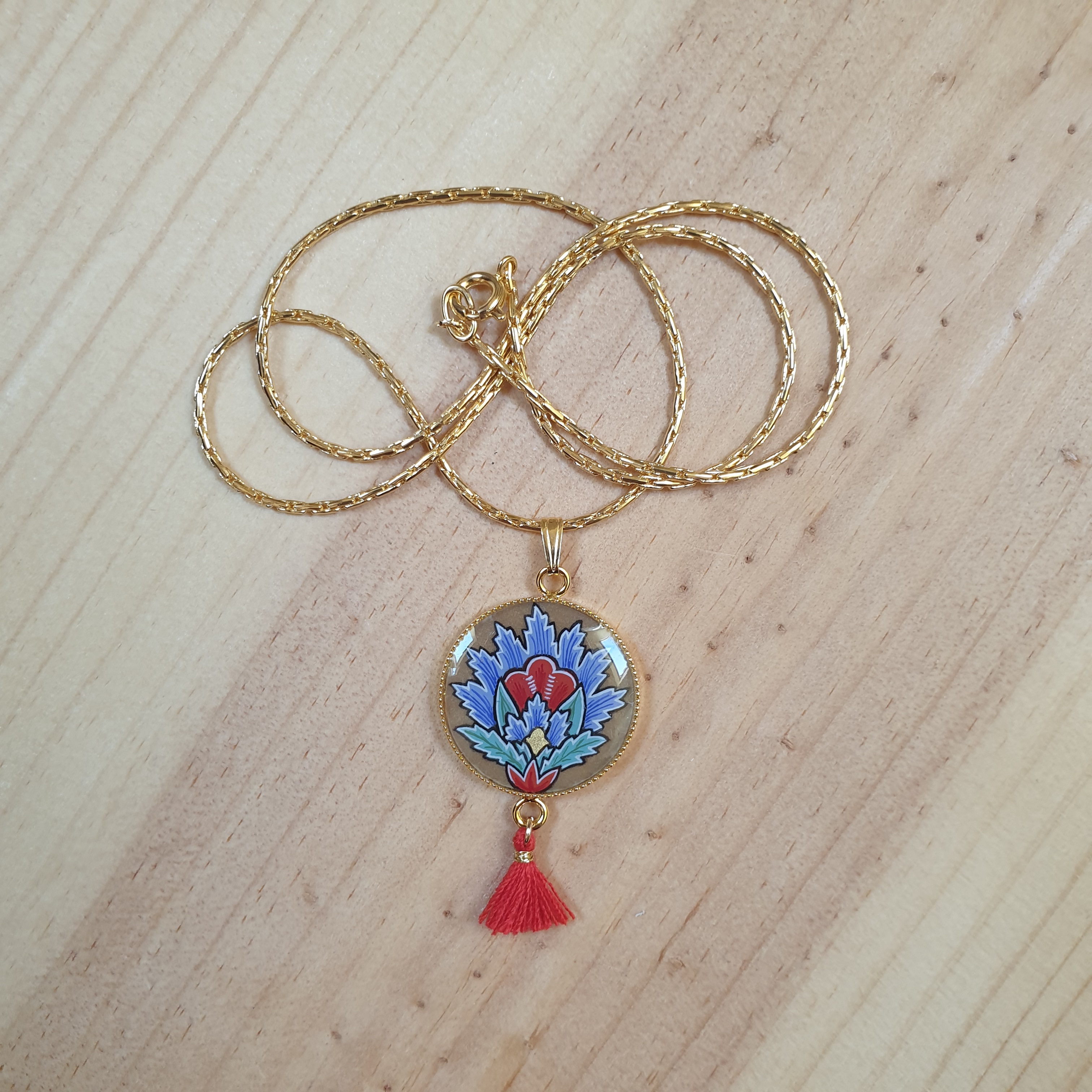 Pingente de colar azul iluminado flor oriental