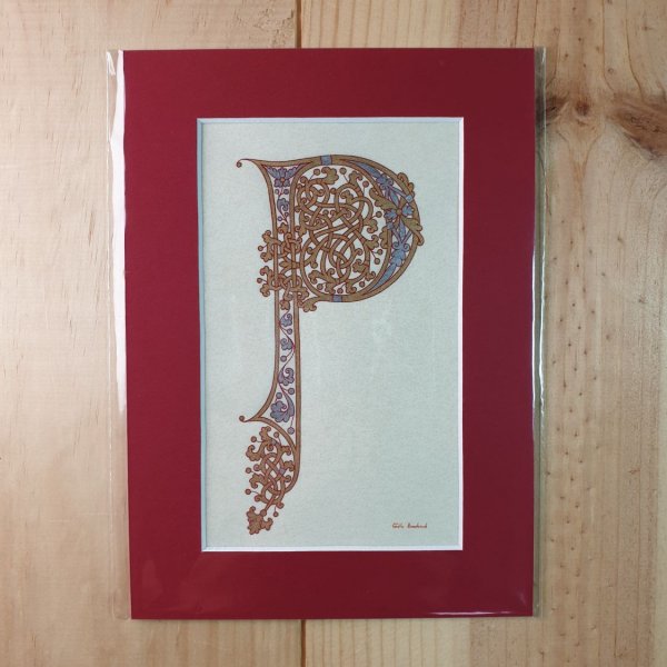 Letra iluminada P em estilo carol&iacute;ngio