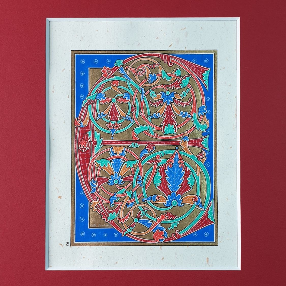 Letra E iluminada em estilo gótico primitivo
