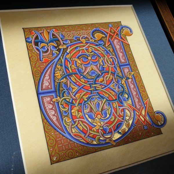 Letra rom&acirc;nica iluminada U emoldurada