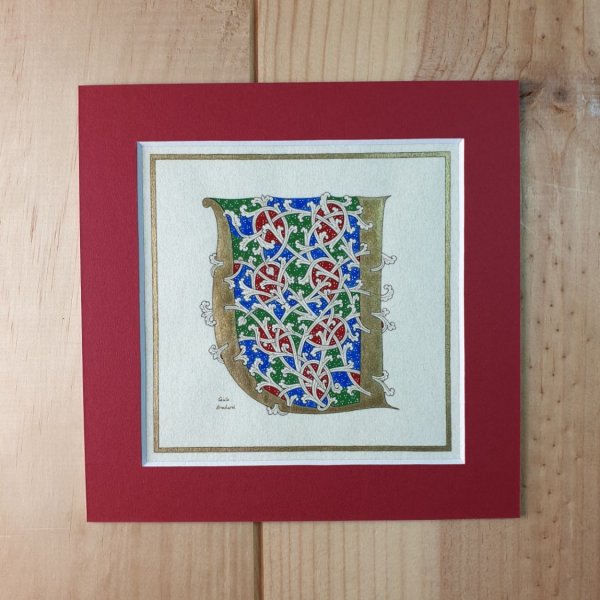 Letra U iluminada em estilo rom&acirc;nico