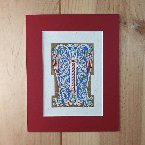 Letra M iluminada em estilo rom&acirc;nico