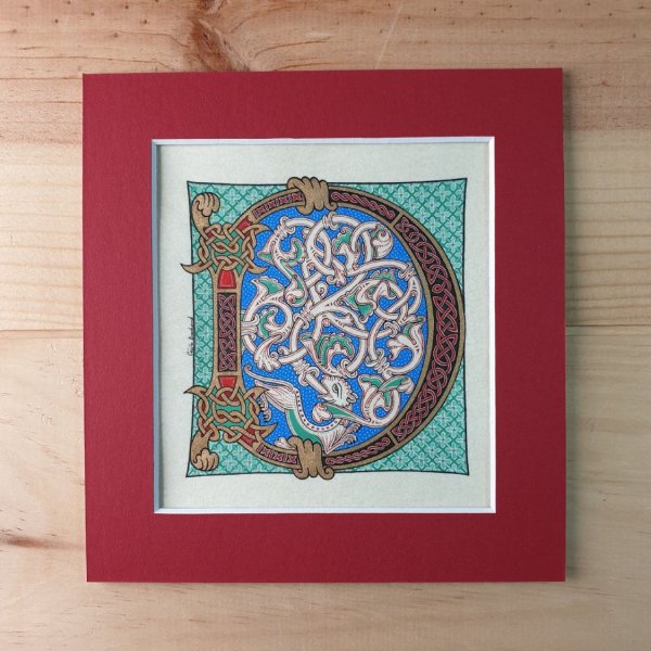 Letra D iluminada em estilo rom&acirc;nico