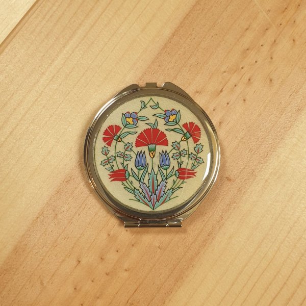 Miroir de sac enluminure fleurs orientales sur parchemin