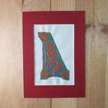 Letra L iluminada em estilo ottoniano